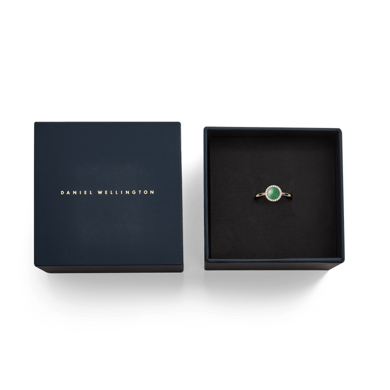 Audrey Ring Jade Rose Gold presented in a Daniel Wellington gift box, highlighting the elegant green jade centrepiece and cubic zirconia halo for a stylish gifting option.