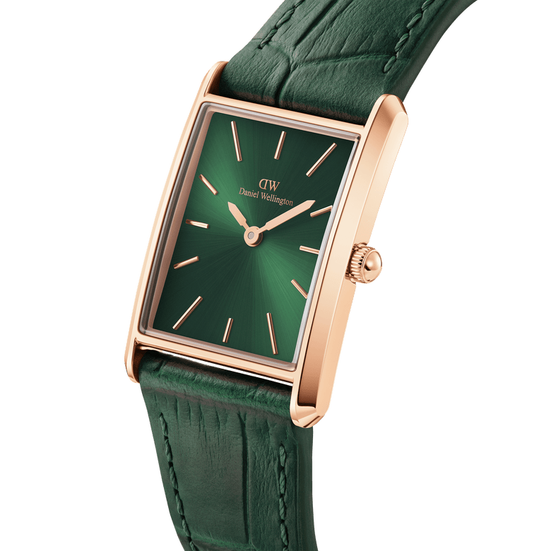 Bound Crocodile Emerald Sunray Rose Gold watch featuring a rectangular rose gold case, emerald green sunray dial, and crocodile-embossed leather strap, shown in a close-up angled view highlighting its premium finish and minimalist design.