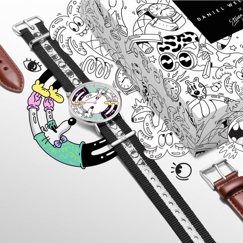 Steven Harrington x Daniel Wellington limited edition watch set featuring a multicolour printed dial, black and white illustrated NATO strap, brown leather strap, and collectible packaging with playful artwork.