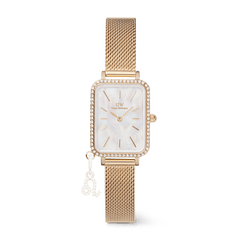 Quadro Crystal Zodiac Evergold gold watch for women with a slim rectangular case, crystal-framed bezel, mother of pearl dial, and a gold mesh strap featuring an interchangeable zodiac charm.