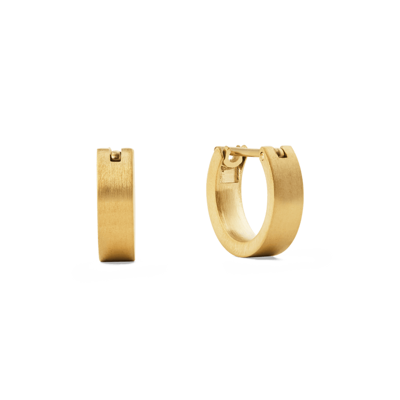 A pair of small brushed gold hoop earrings with a minimalist, softly textured finish and a secure latch-back closure, shown from both side and front angles against a plain background.