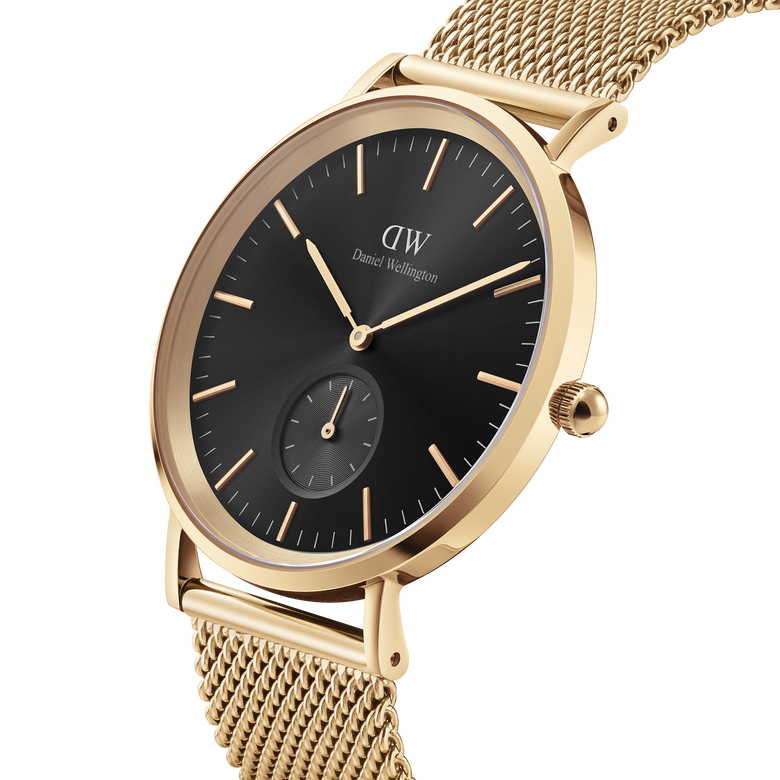 Classic Multi-Eye Evergold Onyx men's watch with a black multi-eye dial, gold hour markers, and a gold mesh strap, shown in a close-up angle highlighting its minimalist design and polished PVD gold finish.