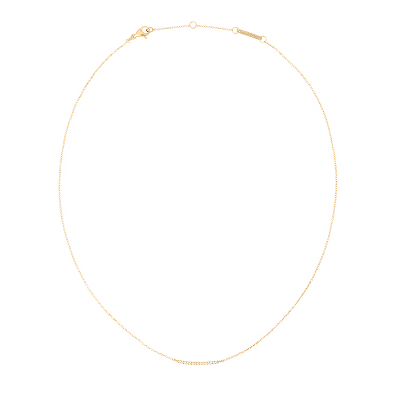 Delicate gold necklace with a slim chain and a fixed bar pendant set with white cubic zirconia stones, featuring an adjustable clasp for a custom fit.