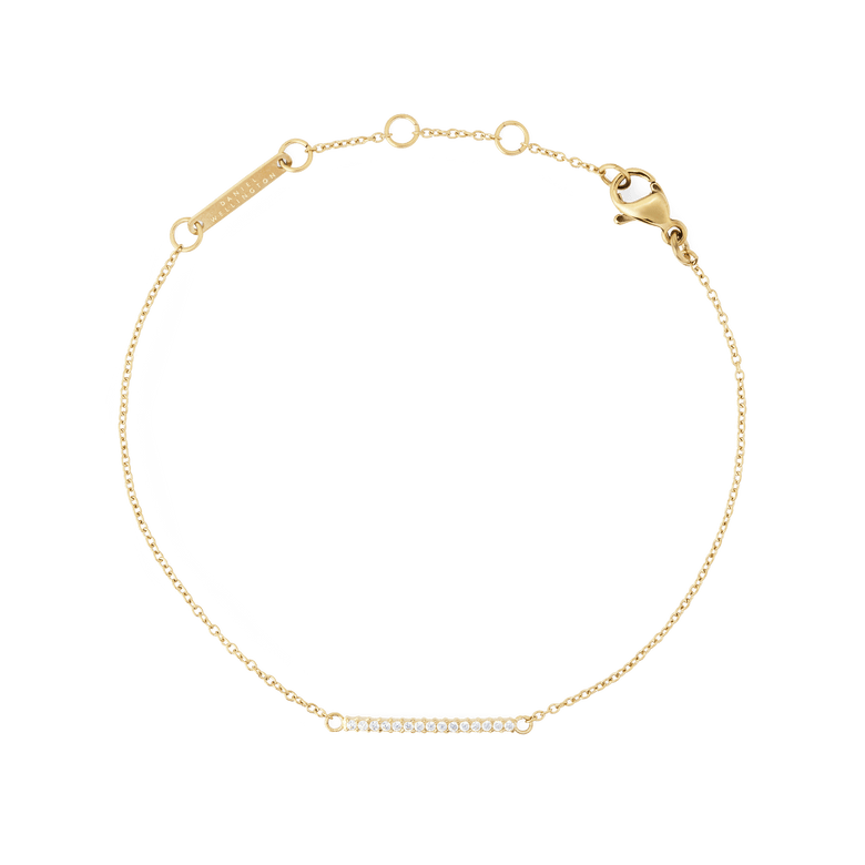 Slim gold Mirelle Eternity Bracelet featuring a fine adjustable chain and a delicate bar set with sparkling white cubic zirconia stones, designed for a subtle and elegant look.