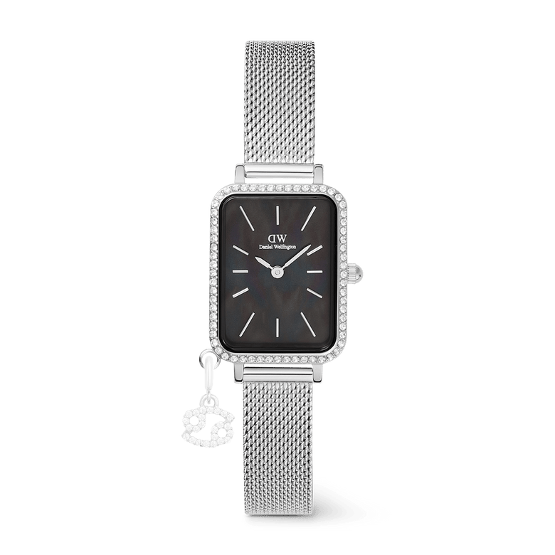 Rectangular silver women’s watch with a black mother of pearl dial, crystal-set bezel, silver mesh strap, and a removable zodiac charm, blending elegant design with a touch of personalisation.