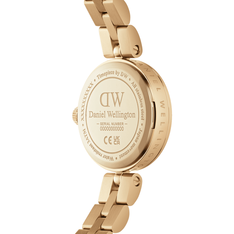 Back view of the Elan Lumine Gold watch, highlighting the engraved stainless steel case, gold finish, and three-link bracelet, with water resistance and serial number details visible.