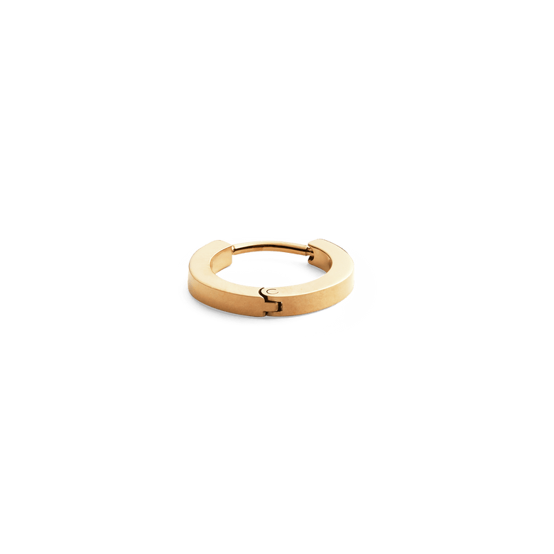 Petite gold hoop earring with a minimalist design and warm gold tone, crafted from stainless steel with PVD gold plating and a secure clasp.