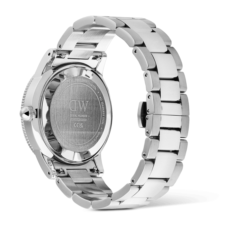 The back view of the Daniel Wellington Iconic GMT Link Black Green Ceramic Bezel Silver watch, showing the engraved stainless steel caseback, solid links, and polished silver stainless steel bracelet.