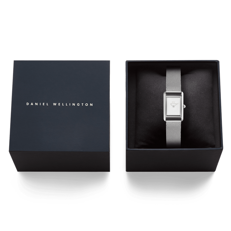 Bound Mini Sterling ladies watch with a rectangular silver-tone case and mesh strap, presented in a dark branded Daniel Wellington gift box.
