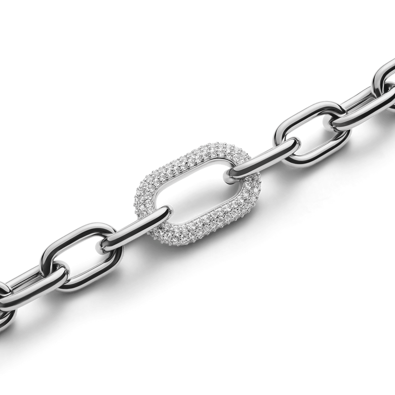 Close-up of the Crystal Link Bracelet Silver highlighting the chunky chain and a single link adorned with sparkling cubic zirconia crystals for a modern, elegant finish.