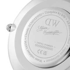Close-up of the Daniel Wellington Bristol BW dial watch case back, engraved with Steven Harrington’s signature, serial number, and details about stainless steel, water resistance, and Japanese movement.