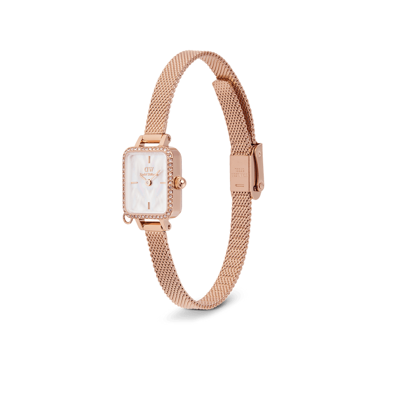 Quadro Mini Crystal Zodiac Melrose featuring a petite rectangular rose gold case, white mother of pearl dial with crystal border, and an adjustable mesh strap for a stylish and comfortable fit.