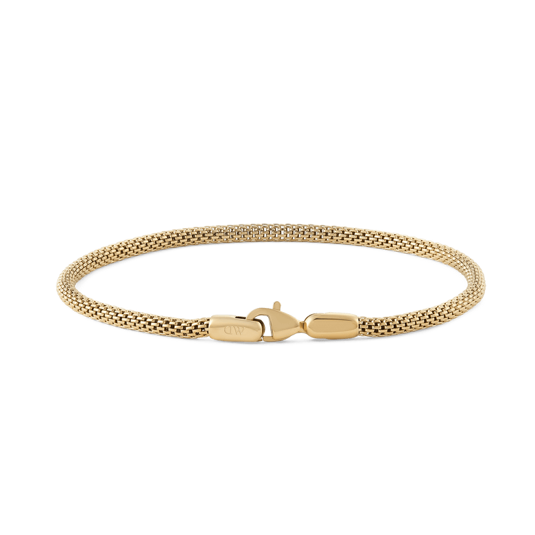 Slim gold mesh bracelet with a lobster clasp, featuring a refined 2.8 mm width and minimalist design, ideal for layering or everyday wear.
