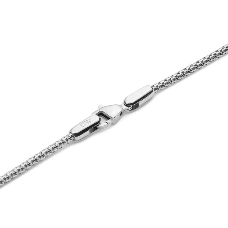 Detail of the Tide Mesh Necklace Silver 1.8 showing the polished silver mesh chain and secure lobster clasp, highlighting the fine craftsmanship and quality stainless steel.