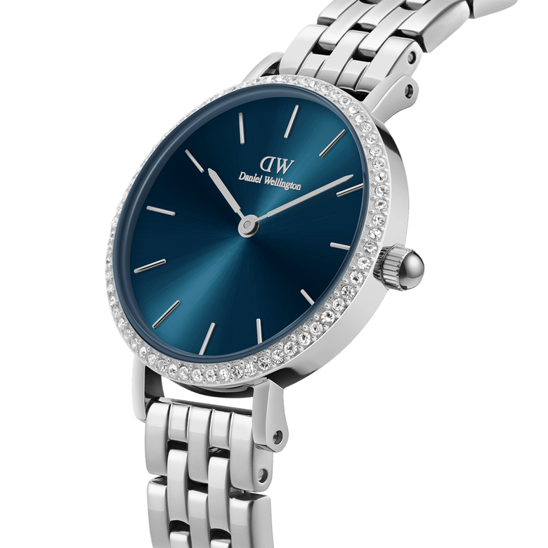 Petite Lumine Bezel 5-Link Arctic S featuring a stainless steel 5-link bracelet, sparkling crystal bezel, and a striking deep blue sunray dial, shown in a close-up angle highlighting its refined details.