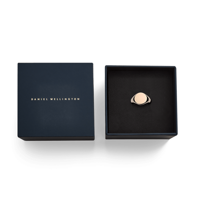 Classic Signet Ring Rose Gold presented in an elegant navy Daniel Wellington gift box, highlighting its polished rose gold finish and minimalist design, ideal for gifting.
