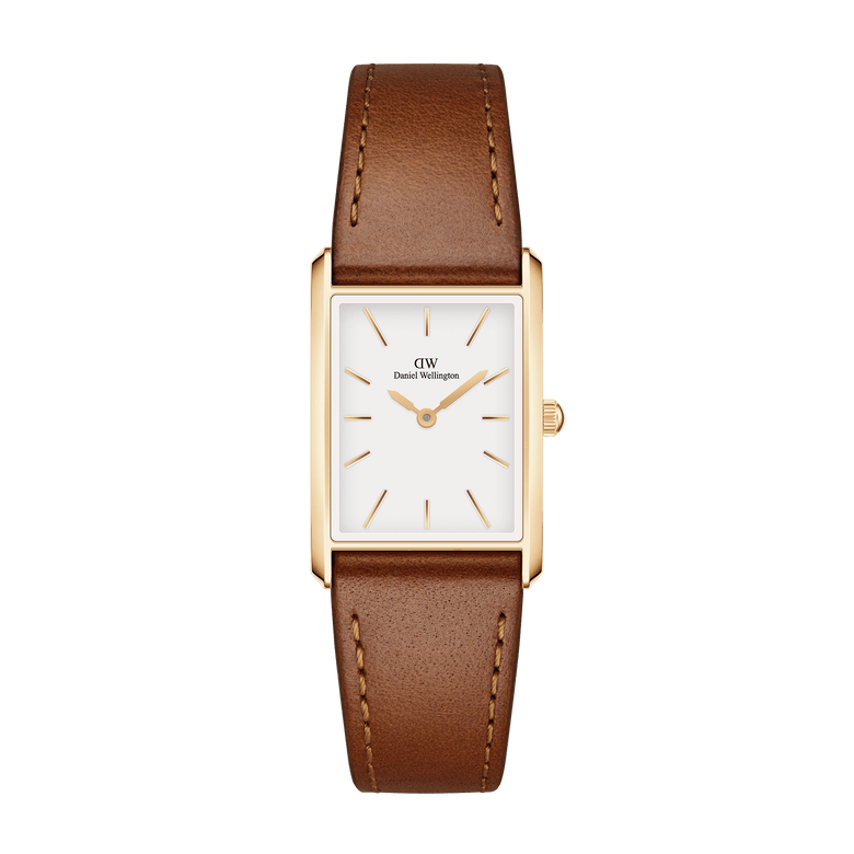 Bound Durham Gold ladies watch with a rectangular gold case, minimalist white dial, gold markers, and a light brown leather strap, designed for everyday elegance and versatility.