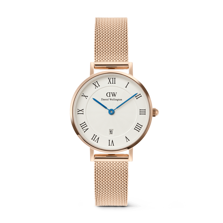 Petite Roman Numerals Date Rose Gold ladies watch with a 28mm rose gold case, white guilloché-patterned dial featuring blue hands, Roman numerals, a date window at 6 o’clock, and a slim rose gold mesh strap.