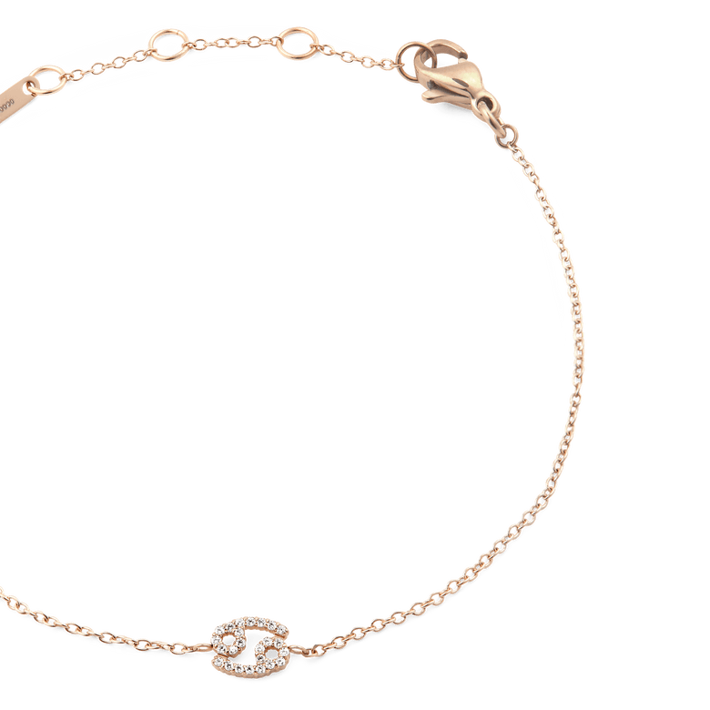 Crystal Zodiac Chain Bracelet Rose Gold featuring a slim adjustable chain and a sparkling zodiac pendant set with crystals, ideal for adding a personalised accent to your jewellery collection.