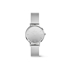 Daniel Wellington Petite Reflection Silver ladies watch with a 28mm mirror-effect silver dial and a slim, polished mesh strap, featuring a minimalist design ideal for everyday and formal occasions.