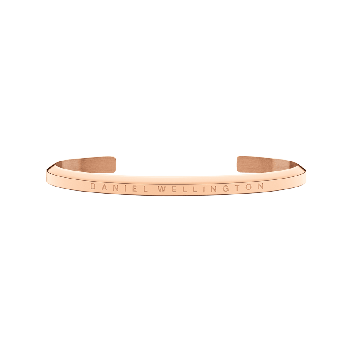 Classic Bracelet Rose Gold by Daniel Wellington in a minimalist open cuff style, featuring a slim stainless steel band with PVD plated rose gold and engraved branding.