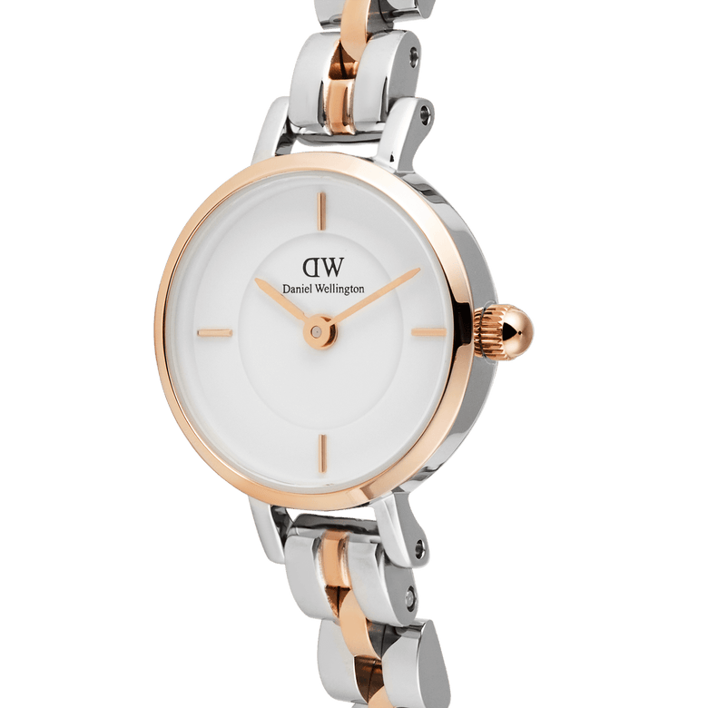 Close-up of the Petite Mini Arch 3-Link Two Tone Rose Gold watch, highlighting its minimalist white dial, rose gold bezel, and polished three-link bracelet in rose gold and silver.
