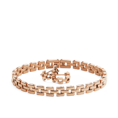 Rose gold jewellery set featuring a three-link chain bracelet and matching earrings, both with a polished, modern design and warm metallic finish.
