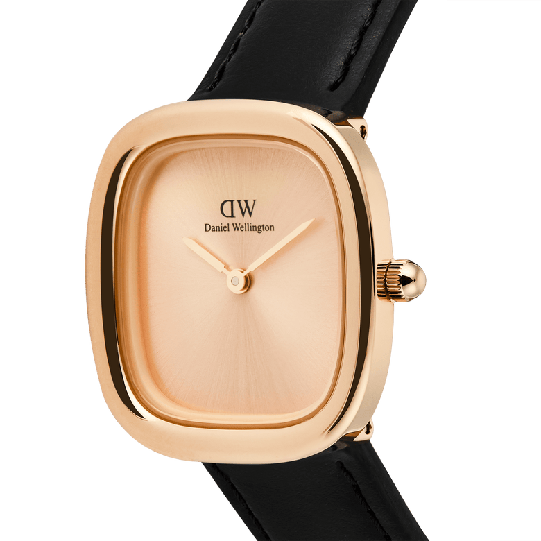 Close-up of the Margot Sheffield Unitone Sunray Rose Gold ladies watch, showing the cushion-shaped polished rose gold case, minimalist sunray dial, and slim black leather strap.