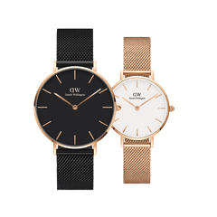 Daniel Wellington Petite Melrose + Petite Ashfield bundle featuring two mesh strap watches for women, one with a black dial and black mesh strap, and the other with a white dial and rose gold mesh strap, both with slim rose gold cases and minimalist design.