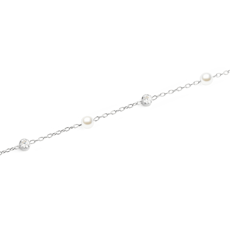 Close-up of the Pearl Bracelet Silver showing its fine silver chain with alternating white Swarovski glass pearls and sparkling cubic zirconia, highlighting the minimalist and elegant design.