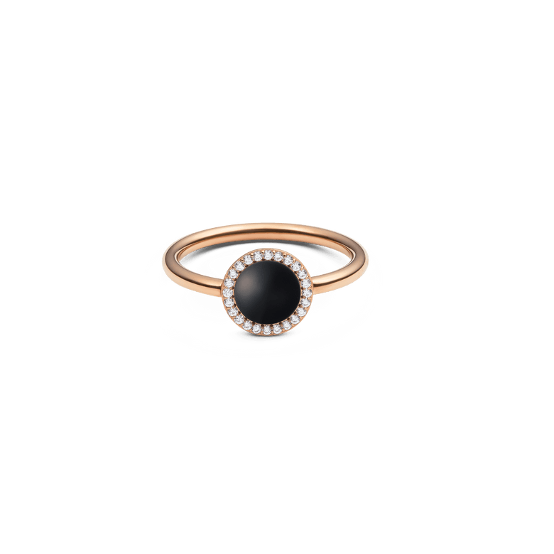 Rose gold ring featuring a round black agate centre stone surrounded by a halo of white crystals, set on a slim, polished band.