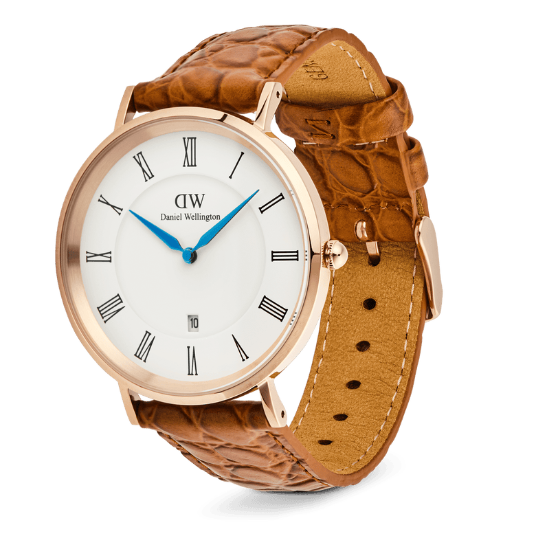 Classic Roman Numerals Date Light Brown Croc Belly Rose Gold men’s watch with a rose gold case, white dial, black Roman numerals, blue hands, date display at six o’clock, and a light brown croc-embossed leather strap with pin buckle closure.