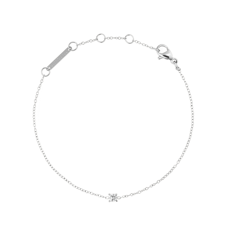 Delicate silver bracelet with a fine adjustable chain, featuring a single cubic zirconia crystal as the centrepiece and a secure lobster clasp, designed for a refined and timeless look.