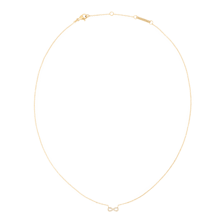 Thin gold chain necklace featuring a delicate infinity pendant set with white cubic zirconia crystals, designed for minimalist style and everyday elegance.