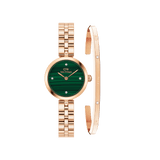 Rose gold Daniel Wellington watch with a deep green malachite dial and matching rose gold link strap, paired with a slim rose gold bracelet featuring crystal accents for a refined, coordinated look.