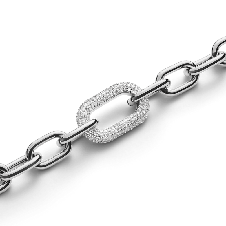 Close-up of the Crystal Link Necklace Silver highlighting its chunky chain and a sparkling, crystal-embellished link crafted from stainless steel and rhodium plated brass.