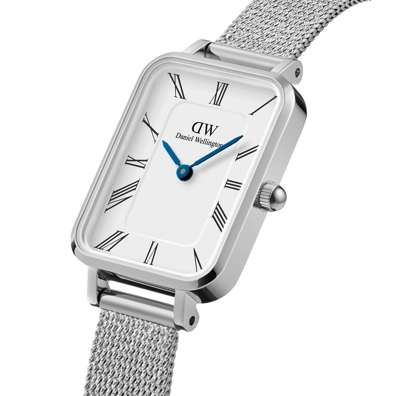 Quadro Roman Numerals Sterling rectangular ladies watch with a polished silver case, crisp white dial featuring Roman numerals, blue steel hands, and a silver mesh strap.