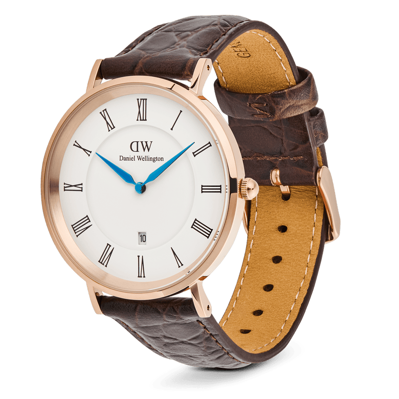 Classic Roman Numerals Date Dark Brown Croc Belly Rose Gold men’s watch with a polished rose gold case, crisp white dial, black Roman numerals, blue hands, date display, and a brown croc-embossed leather strap with pin buckle closure.