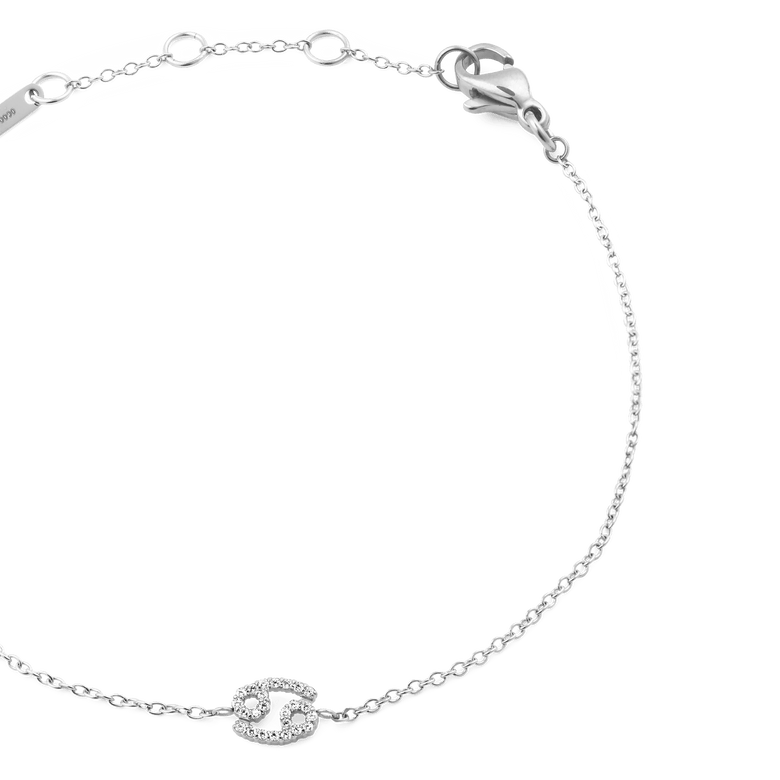 Close-up of the Crystal Zodiac Chain Bracelet Silver showing a delicate silver chain with adjustable sizing rings, a lobster clasp, and a Cancer zodiac charm set with sparkling crystals.