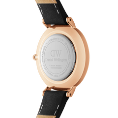 Back view of the Petite Roman Numerals Sheffield Rose Gold watch, showing the engraved stainless steel case, rose gold finish, and black genuine leather strap.