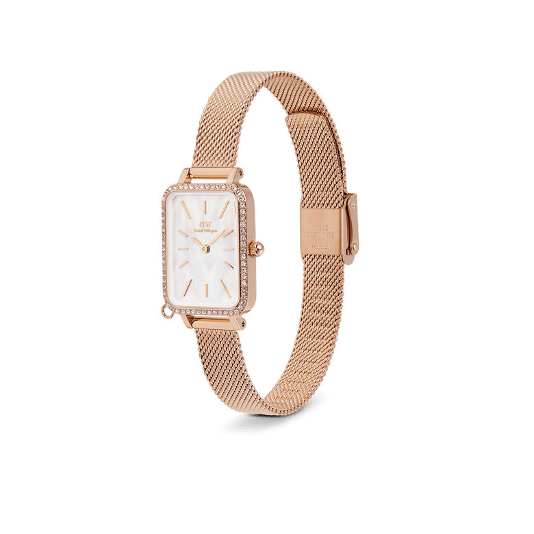 Quadro Crystal Zodiac Melrose ladies watch with a rectangular rose gold case, crystal border, white mother of pearl dial, and an adjustable rose gold mesh strap.