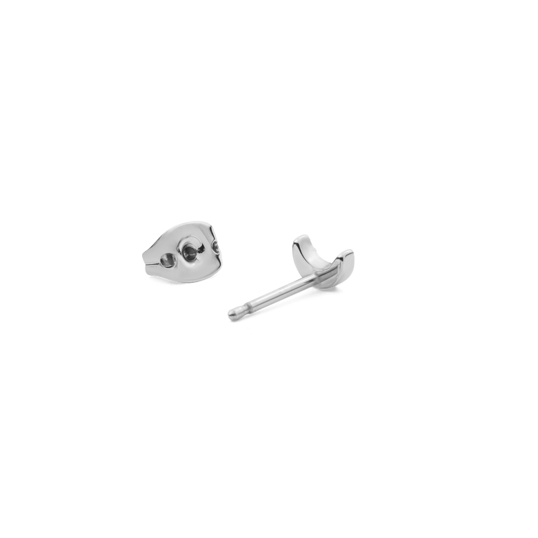 Crystal Moon Stud Silver earring and backing in polished stainless steel, featuring a petite crescent shape and minimalist design suitable for sensitive skin.