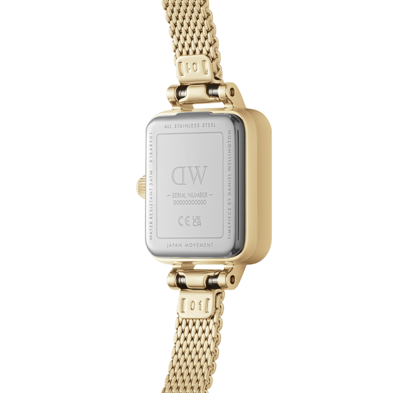 Quadro Mini Evergold Onyx gold watch showing the stainless steel case back with engraved details and a gold mesh strap, highlighting its water resistance and Japanese quartz movement.