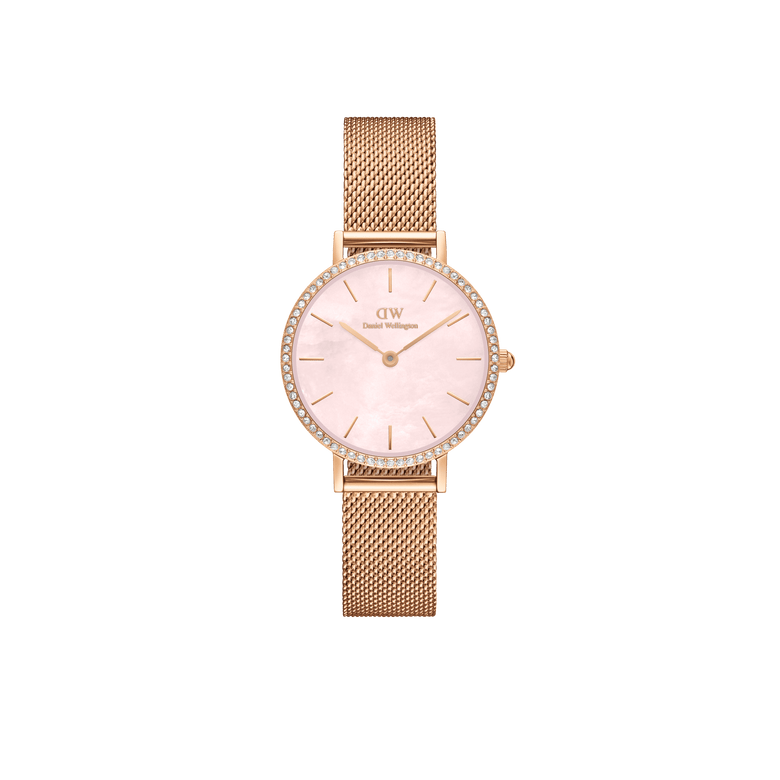 Rose gold ladies watch with a mesh strap, crystal-set bezel, and a pink mother of pearl dial, featuring minimalist hour markers and a slim profile.