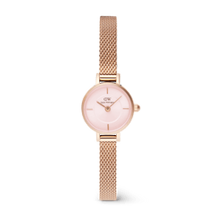 Petite Mini Blush Melrose features a 19mm rose gold case, blush pink sunray dial, and an adjustable mesh strap, offering a refined and lightweight watch suitable for everyday wear.