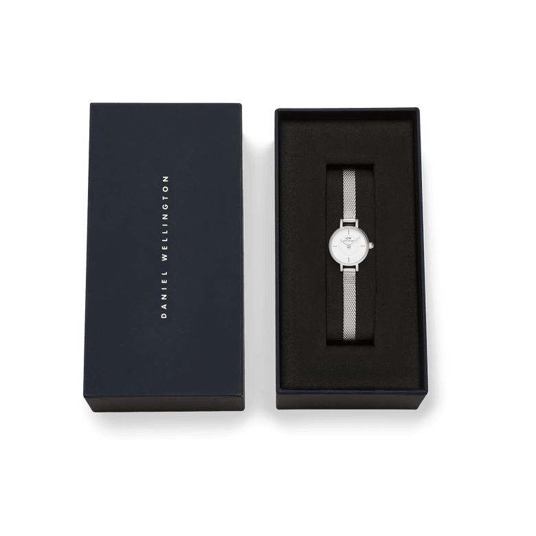 Petite Mini Sterling silver watch with a minimalist white dial and mesh strap, presented in a sleek Daniel Wellington gift box, ideal for gifting on special occasions.