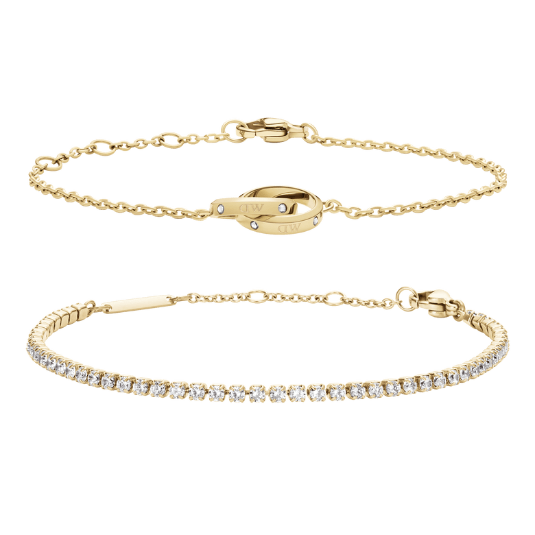 Gold Tennis Bracelet with clear crystals and Lumine Unity Bracelet featuring a delicate gold chain and unity ring detail, both designed for layering or wearing solo for a refined, elegant look.