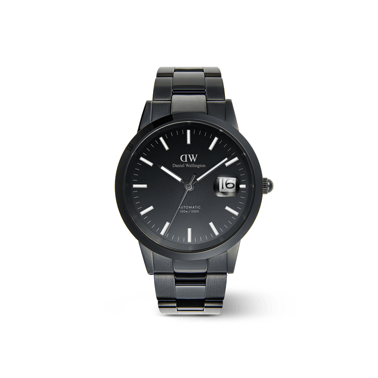 Daniel Wellington Iconic Link Automatic Black watch featuring a 40mm stainless steel case, black enamel dial with luminous markers, a magnified date display, and a sleek black link bracelet.