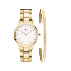 Daniel Wellington Iconic Link + Classic Bracelet Gold set featuring a gold watch with a white dial and matching gold link strap, paired with a slim gold cuff bracelet engraved with the Daniel Wellington logo.