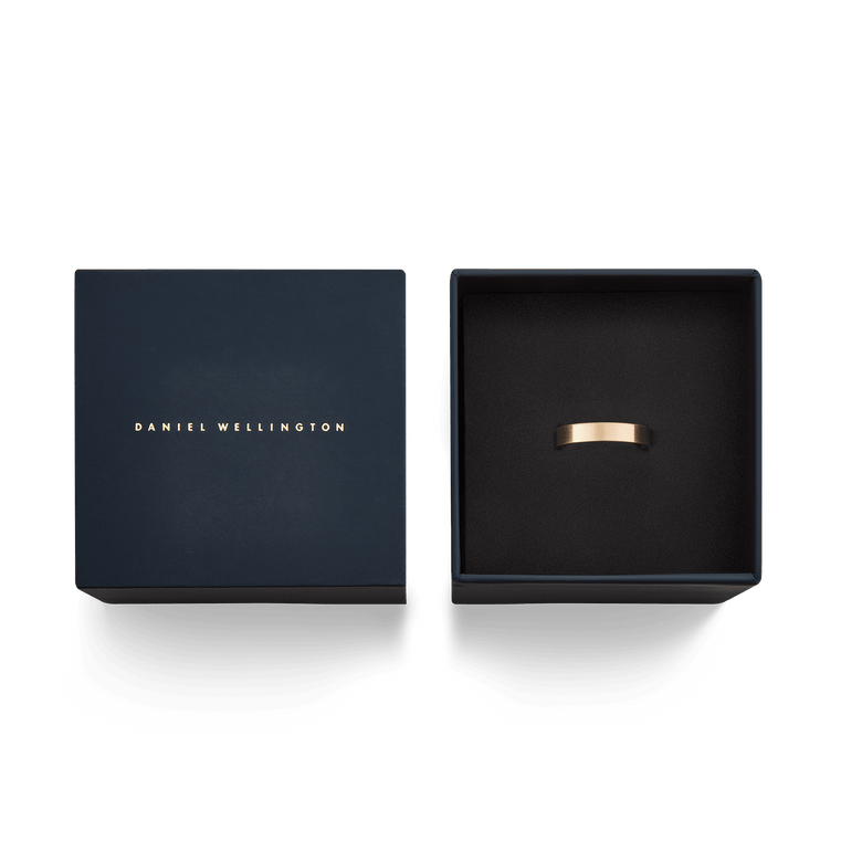 Line Ring Brushed Rose Gold 4.5mm presented in an elegant Daniel Wellington gift box, highlighting its modern brushed rose gold finish and classic band style, ideal for gifting.